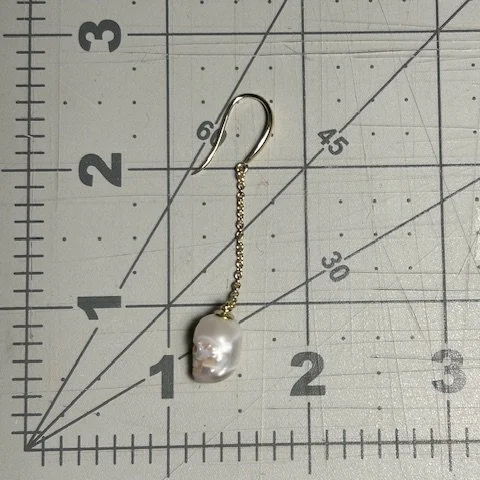 rose_black_2024_dangling_skull_ruler.jpg
