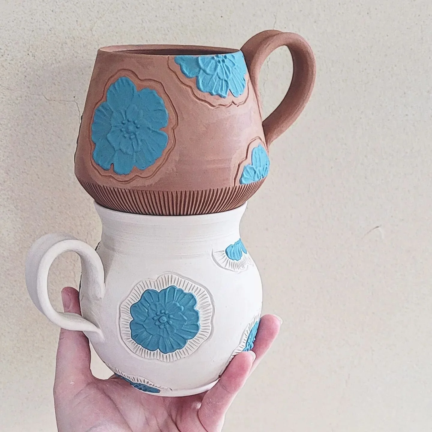 Which one will we like better????? The top will fire to a deep dark chocolate and the bottom creamy white. Still haven't narrowed down if or how I'll decorate/glaze but here goes nothin'!
.
.
.
#mugday #mugshot #monday #mugshotmonday #ceramics #keram