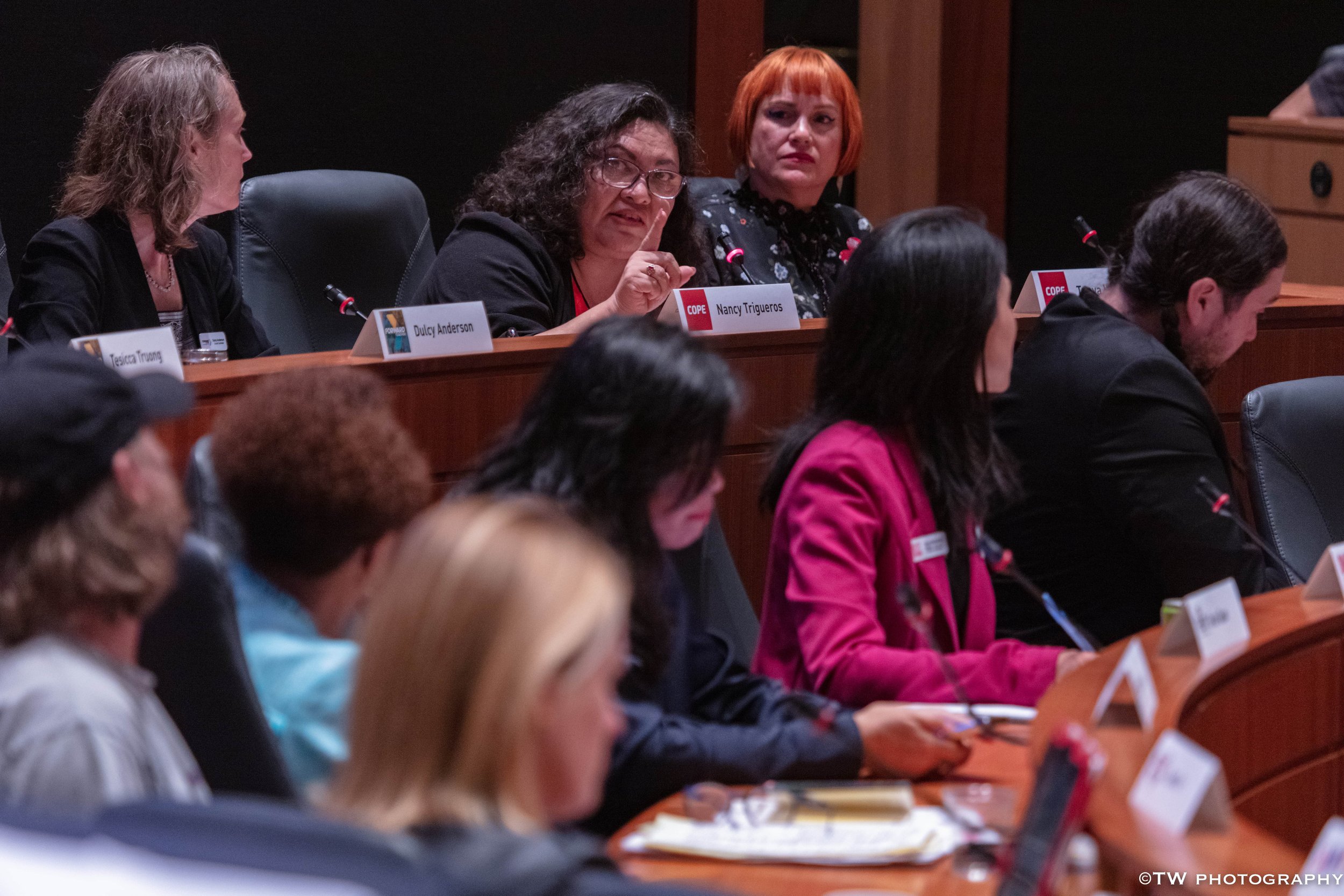 Nancy Trigueros delivering animated response to forum questions