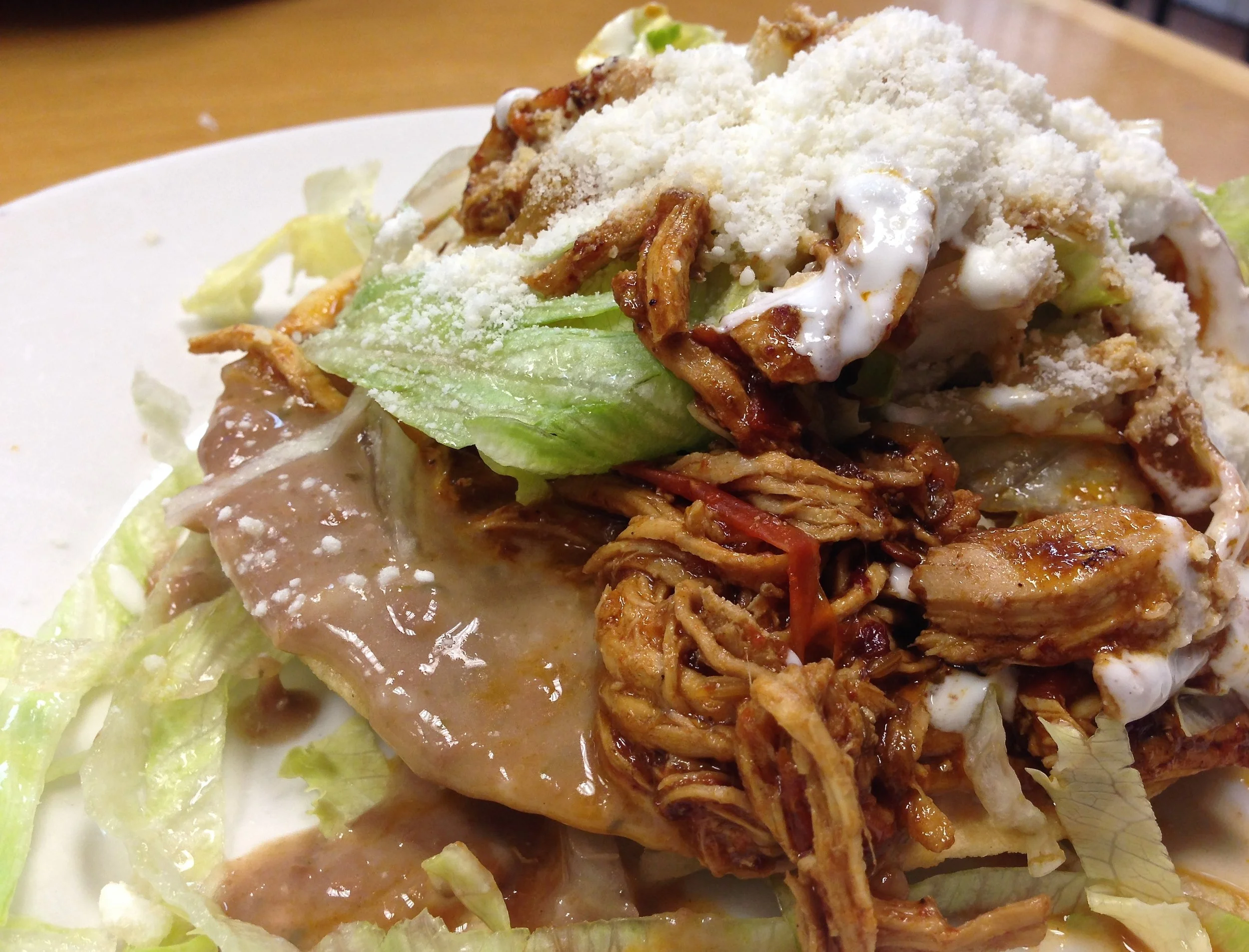Chicken tinga tostada on Roosevelt Avenue in Queens. Mexican street food