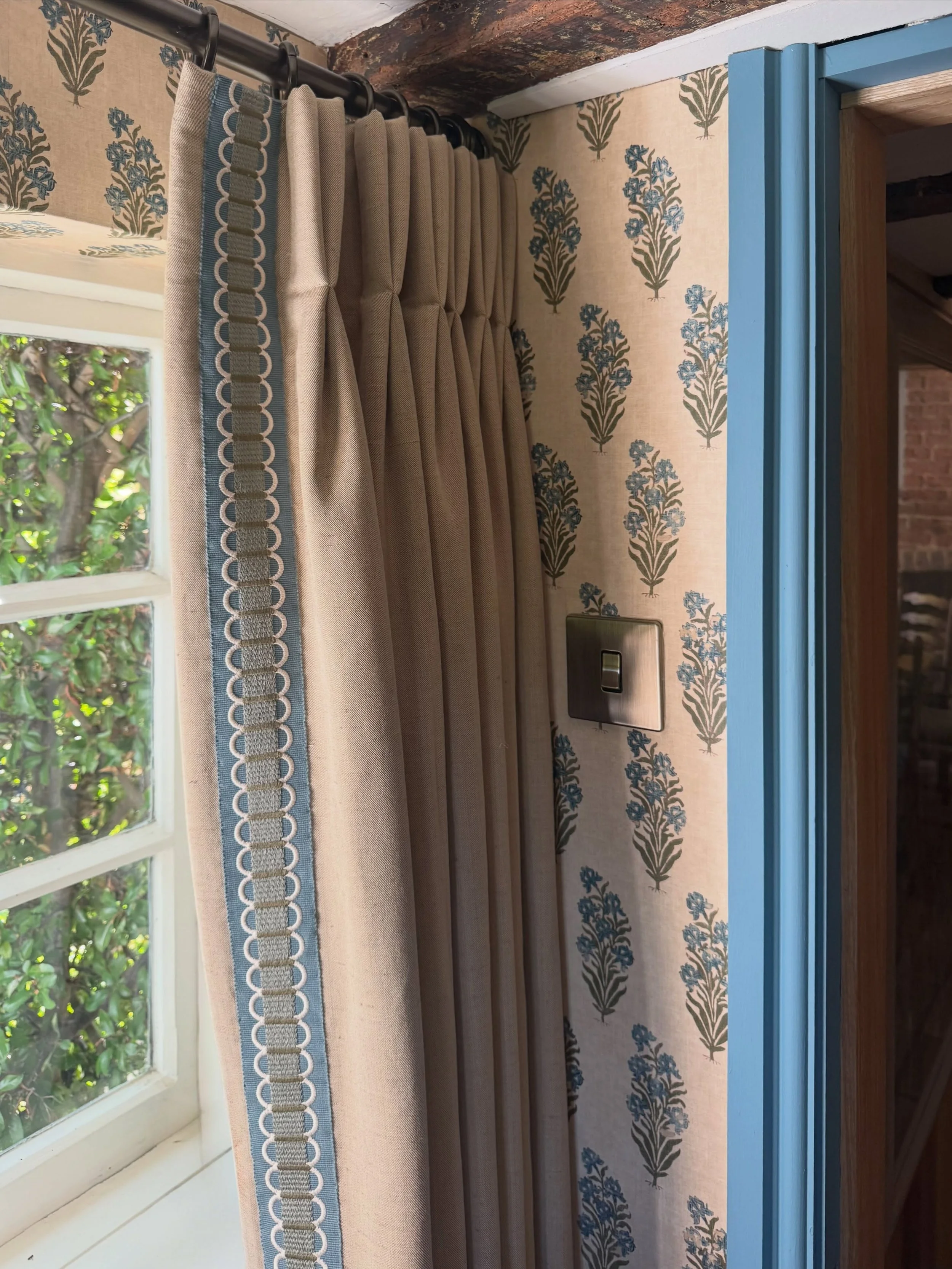 A recently completed study, wrapping the room in a beautiful @chelseatextiles wallpaper, offsetting it with a bold paint colour for the woodwork. These bespoke, handmade curtains were deliberately paired back and we returned to a much loved @claremon