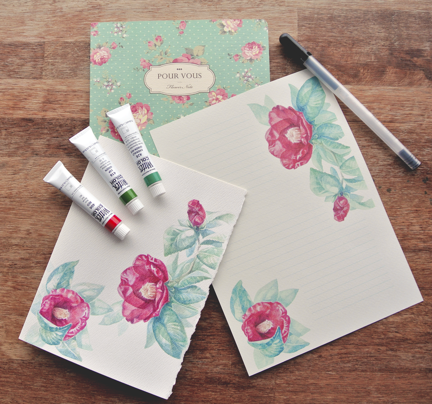 Printable hand drawn letter paper, floral pattern of Camellia flowers in watercolor. Printables available on Etsy by evydraws.