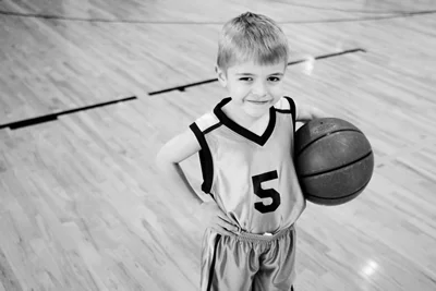 boy holding ball.jpg