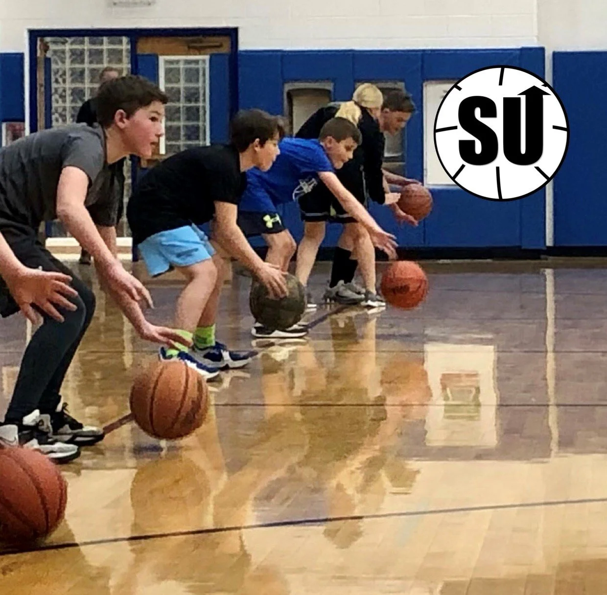 Stationary Ballhandling w SU Logo.jpg