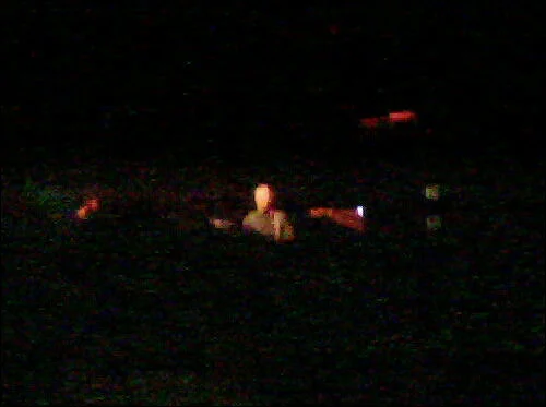 Mobile Phone Picture in Darkness of Explosions in the Sky