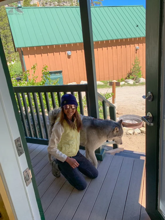 Saying hello to one of the friendly dogs who live at the resort