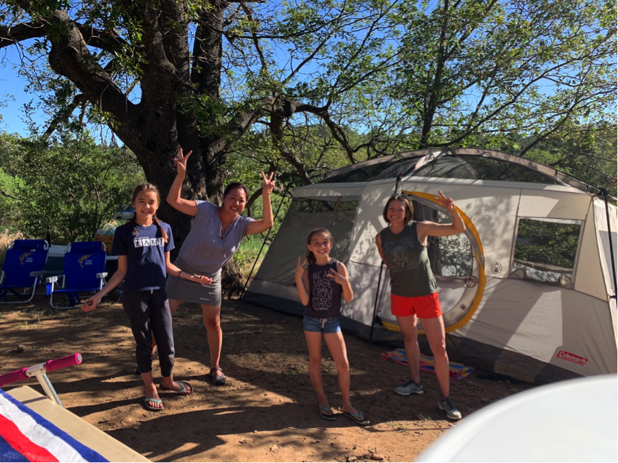The tent is up! ‘Go big or go home’ is our motto. Our shelter is a luxurious 10-person tent, complete with a room divider, so that the girls can stay up all night while us moms can enjoy our beauty sleep.