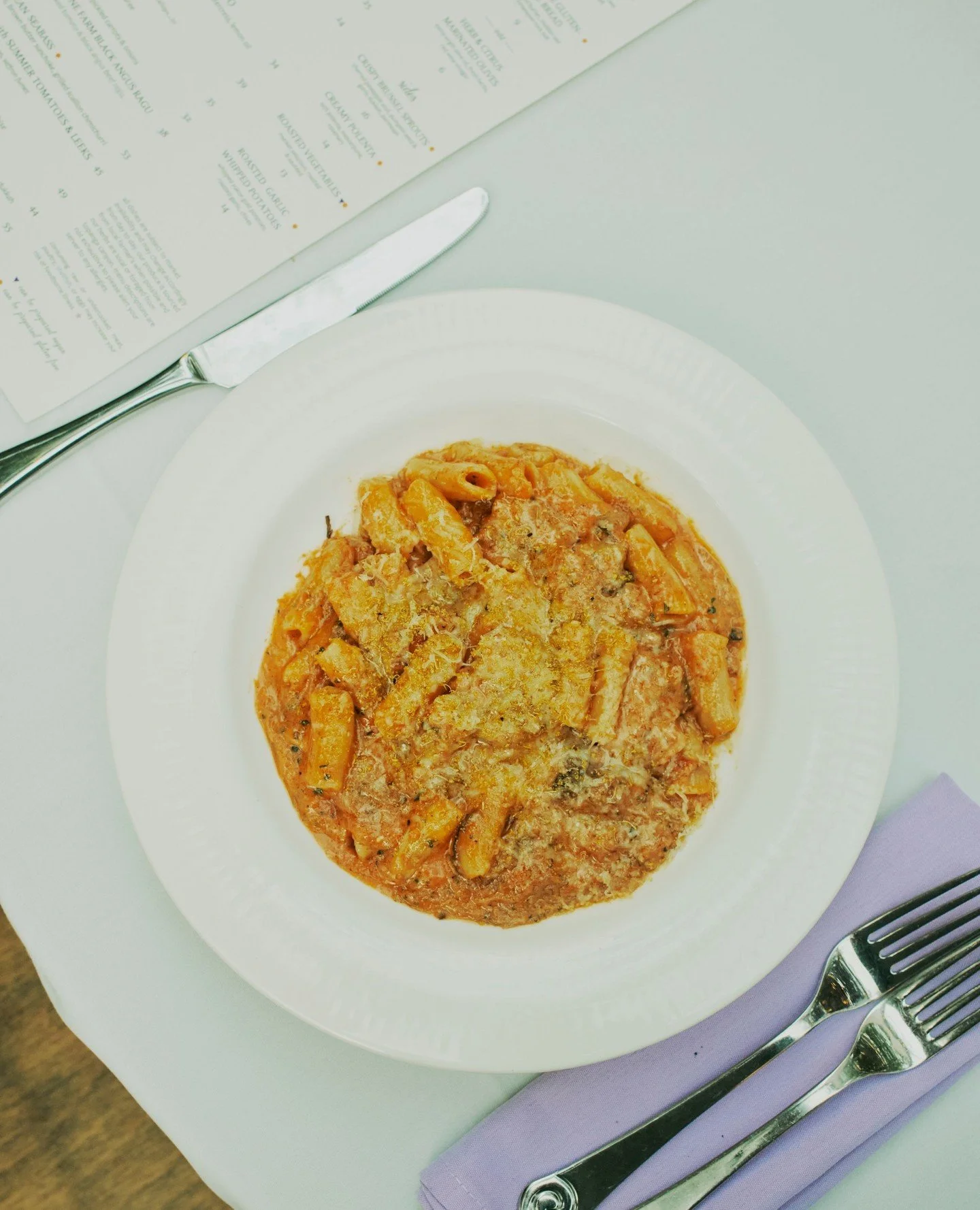 House extruded rigatoni, slow braised short rib ragout, long simmered tomato sauce, aged Parmigiano Reggiano, and fennel pollen. Simple food. Serious love.