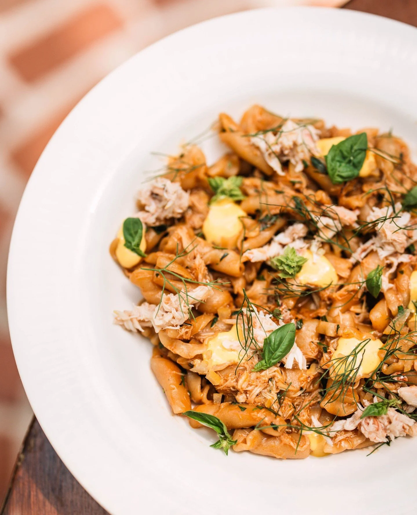 Brand new on the menu. House made campanelle with jumbo lump blue crab, pickled Calabrian chilis, and Thai basil, all brought together with a pernod velout&eacute;. We build the sauce from over 100 pounds of blue crab shells, slowly reduced over days