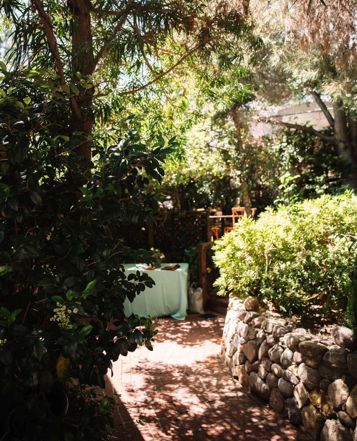 Light through the trees, guiding you down the path.⁠
A table waiting, touched by the same quiet glow.⁠
And just beyond, the creek moving softly beneath it all.⁠
There&rsquo;s something here you can&rsquo;t quite put into words&hellip; you just have t