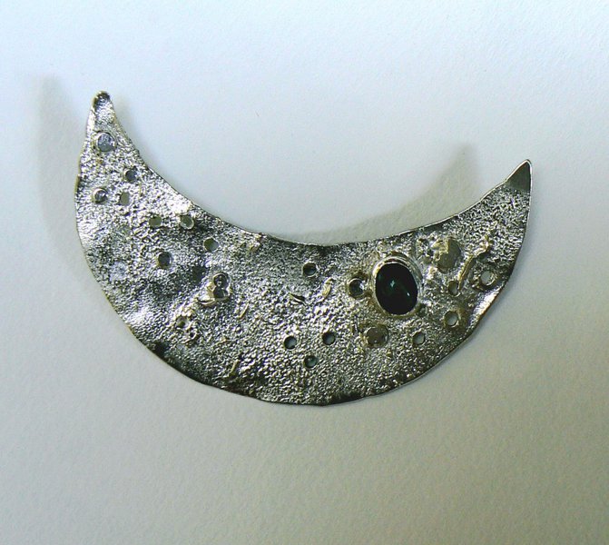 Silver moonscape brooch £300
