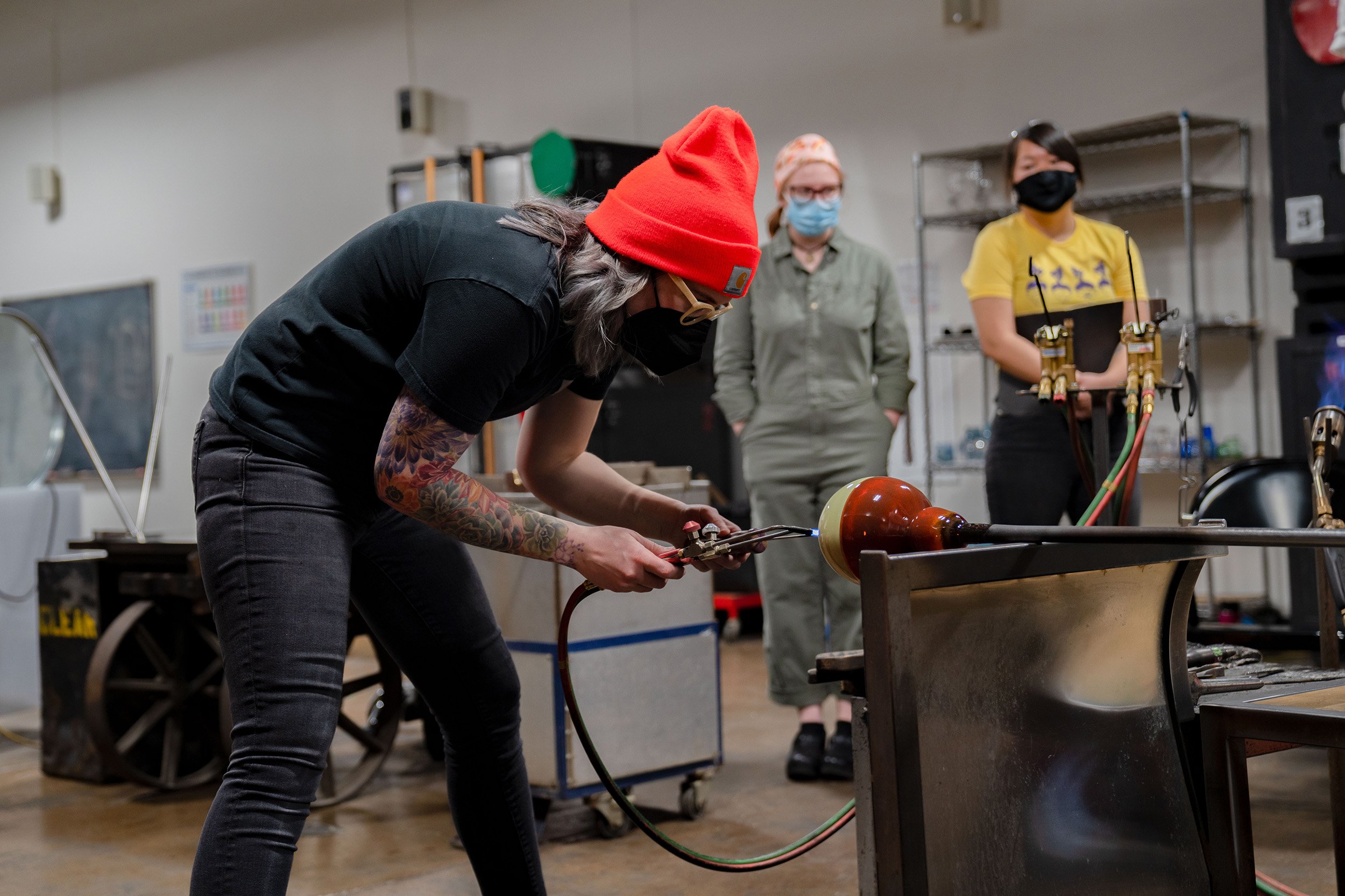 Megan Stelljes assembles a sculpture during a demonstration for students.