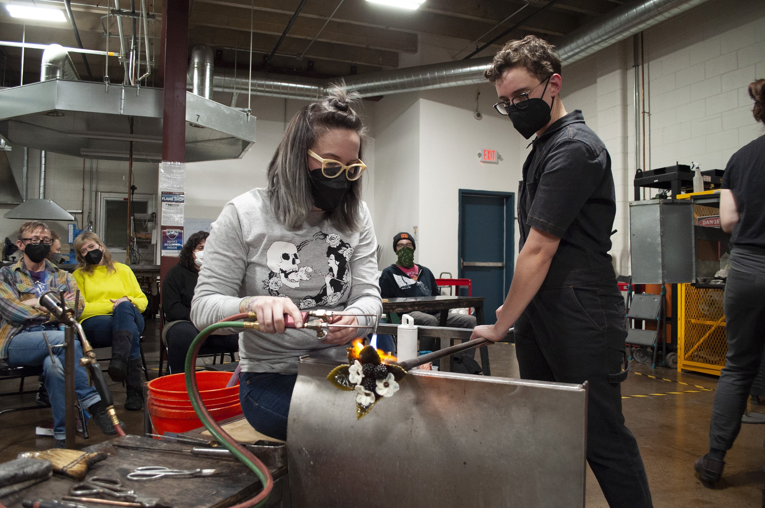 Visting Artist Megan Stelljes being assisted by Executive Director Anna Lehner.