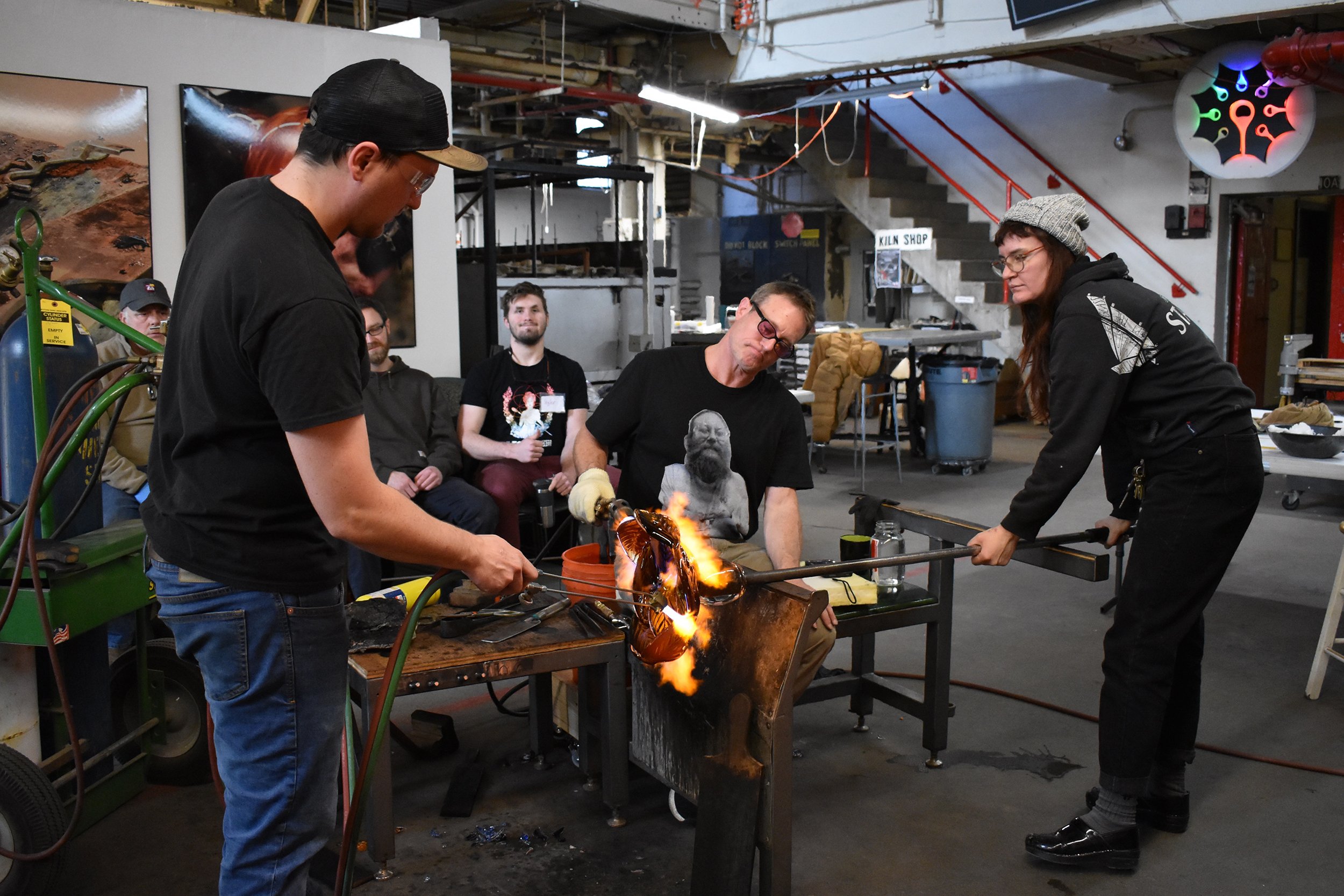 Rob Stern works on a piece during a demonstration for their students.