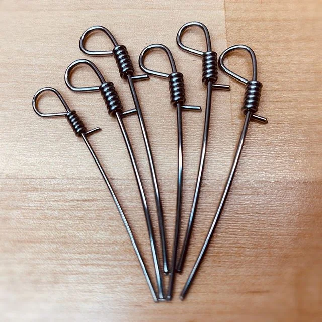 Some piano strings have loops on the end opposite of the tuning pin. I make the loops by hand. Today I was brushing up on my loop making skills in preparation for restringing a concert grand this week. #piano #boise #pianotechnician #pianotuner #music #classicalmusic #craftsmanship #skill #handmade