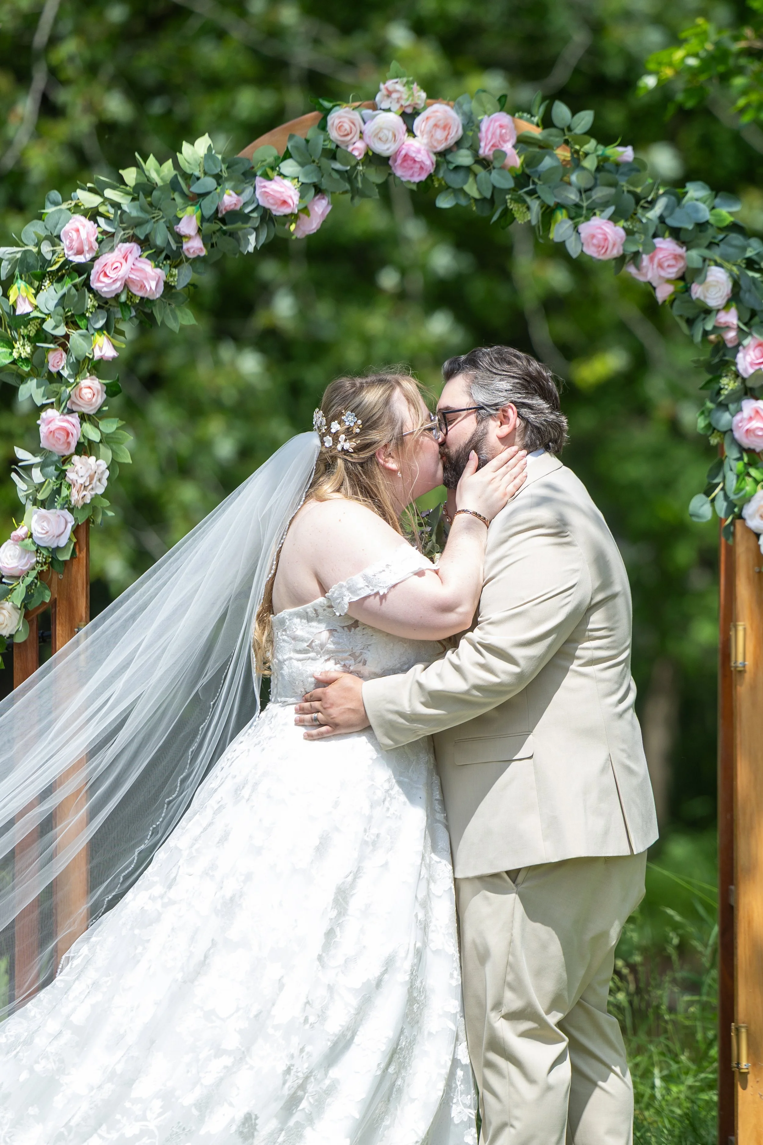 Bride and groom first kiss