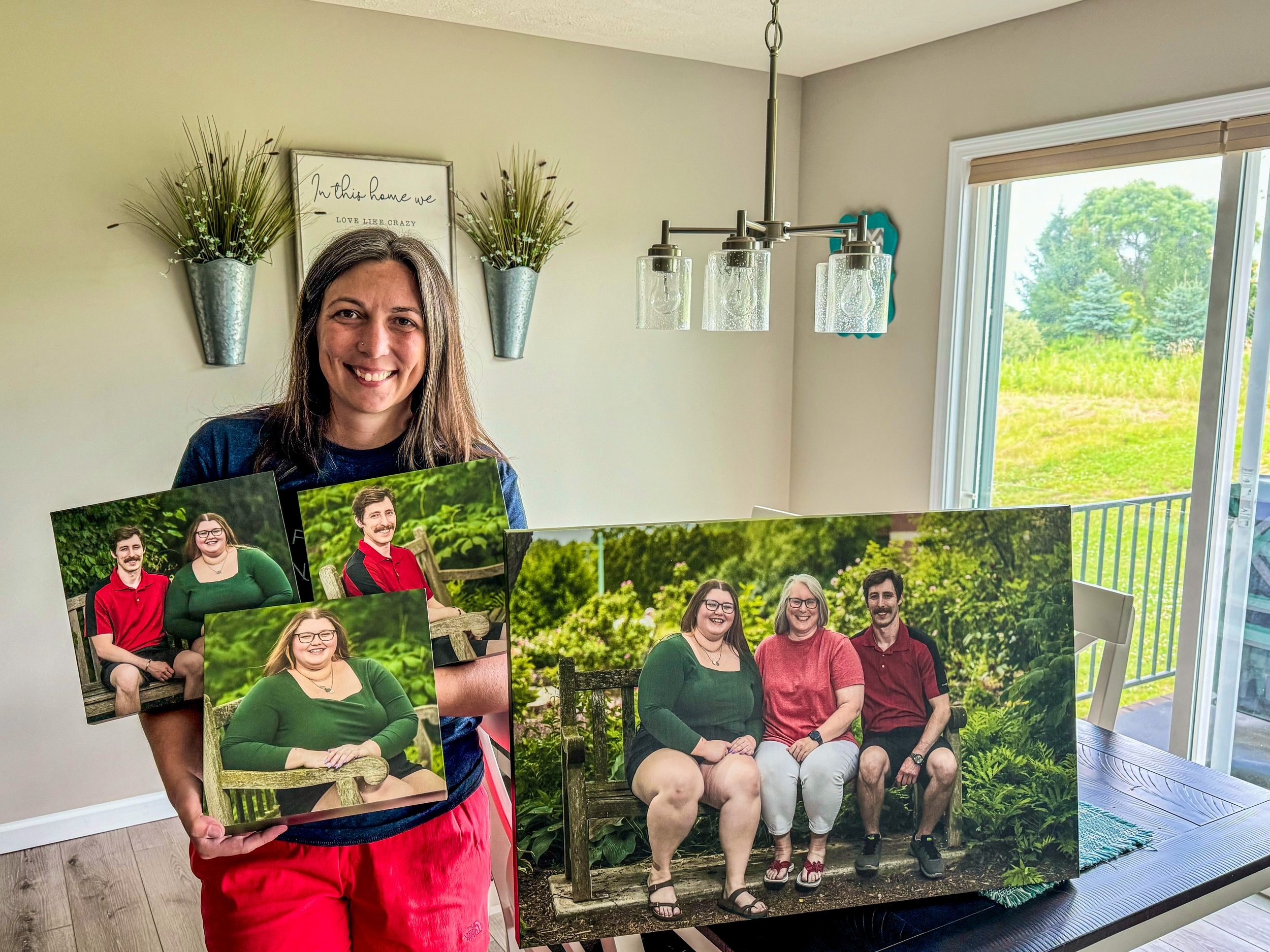 photographer with finished printed photos
