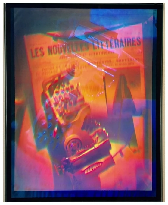 Holographic emulsion in glass. 68x58x2cm. Images pass over each other, as they are made of tangible light, one receding and the other projecting out the glass plate.