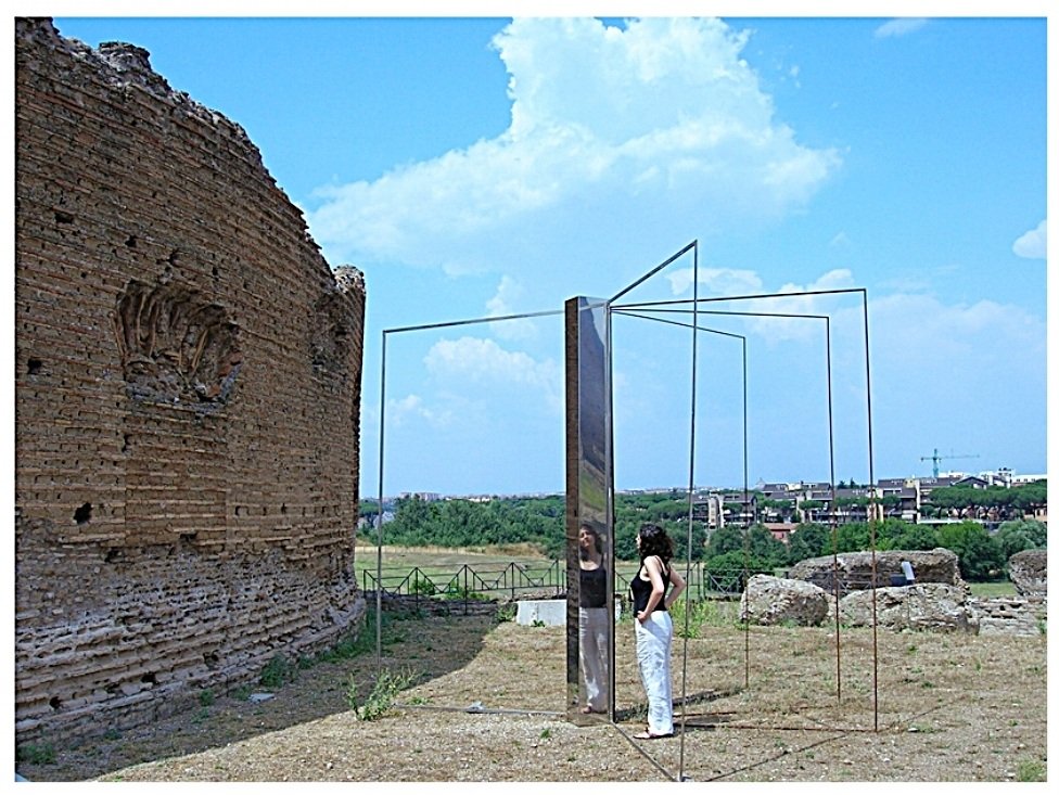 HYPERBOOK. A sculpture written in space. H2.50 mt X 4mt. Mobile structure in Mirror steel and Iron.