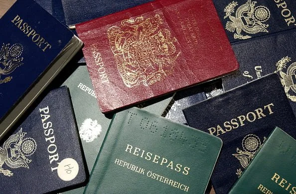 International passports illustrating visa overstay challenges