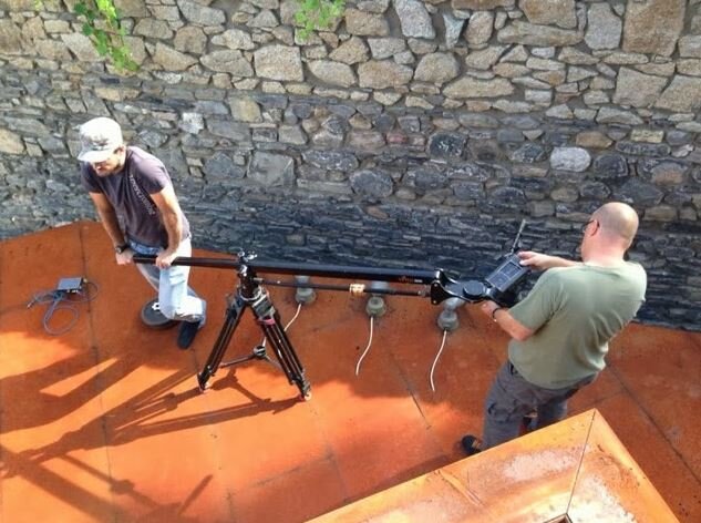 Filming an episode of HGTV Extreme Homes - Standing on the corten roof with camera equipment to get the perfect shot