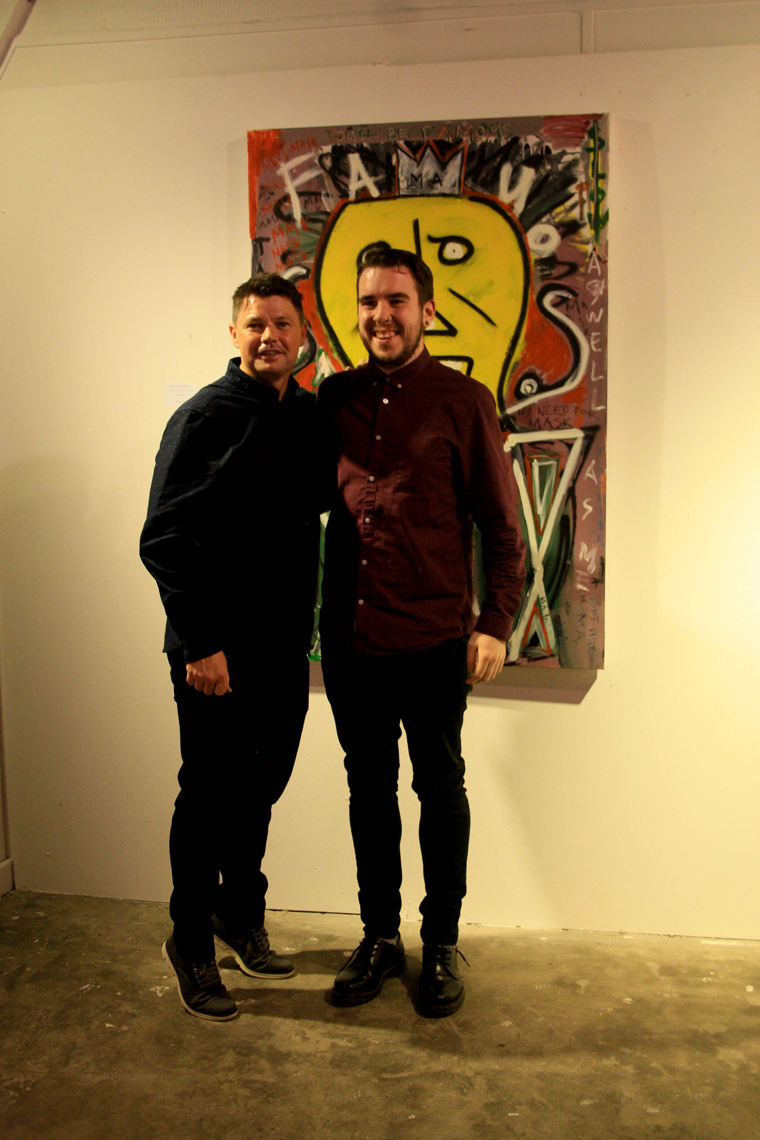 Film maker Mike Andrews and contemporary artist Pigsy photographed at PIGSY's art exhibition in Dublin City Centre in Ireland