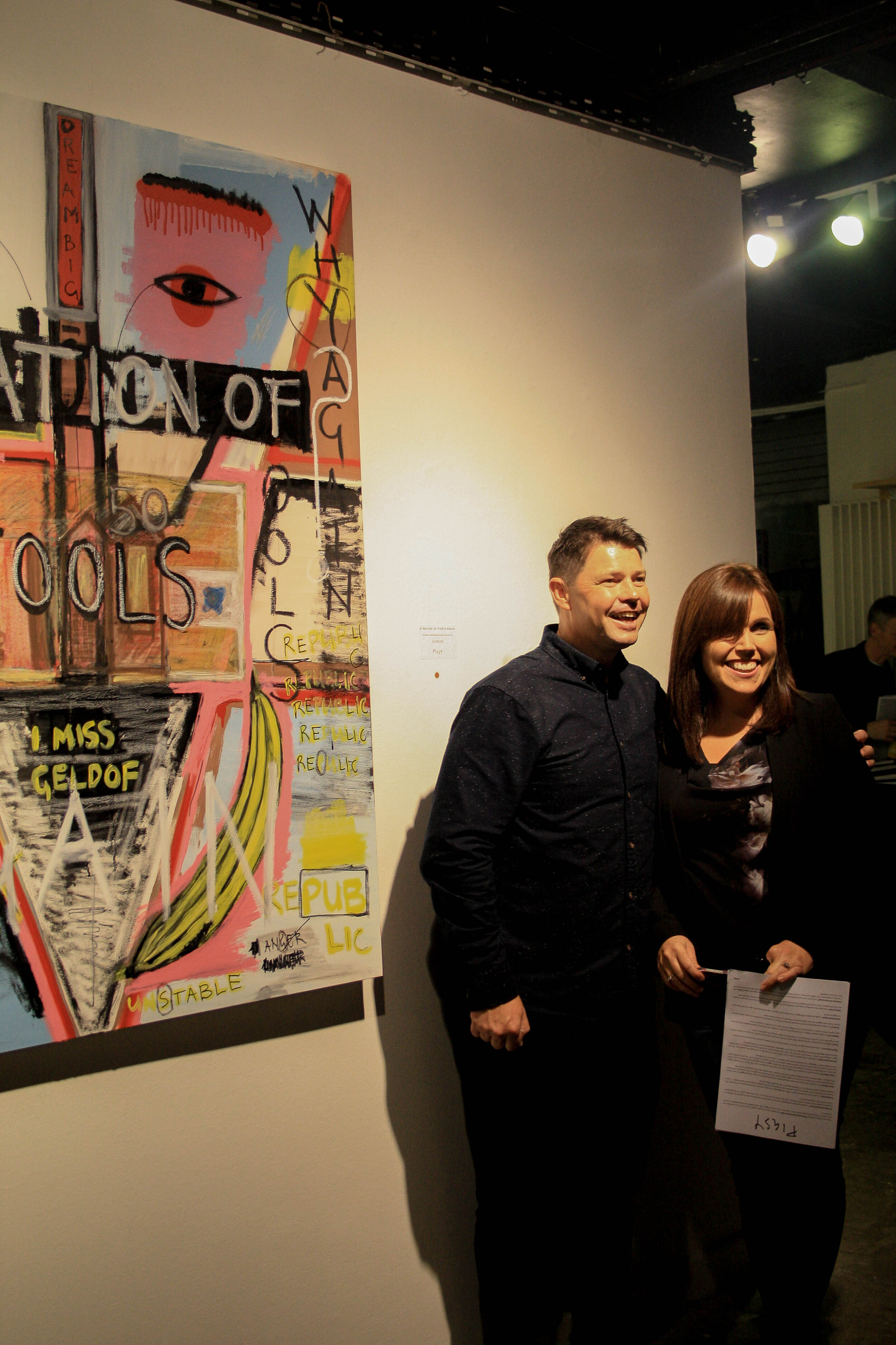 Urban artist Pigsy with art exhibition guests