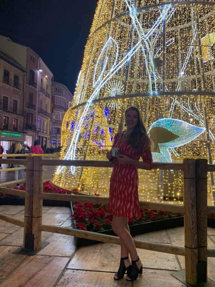 Enid photographed by the Calle Larios Christmas tree here in Malaga, Spain wearing dress from Dunnes Stores and shoes from Marks and Spencers