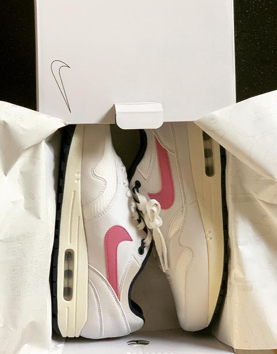 Nike by you custom runners in a unique shoe box and wrapping