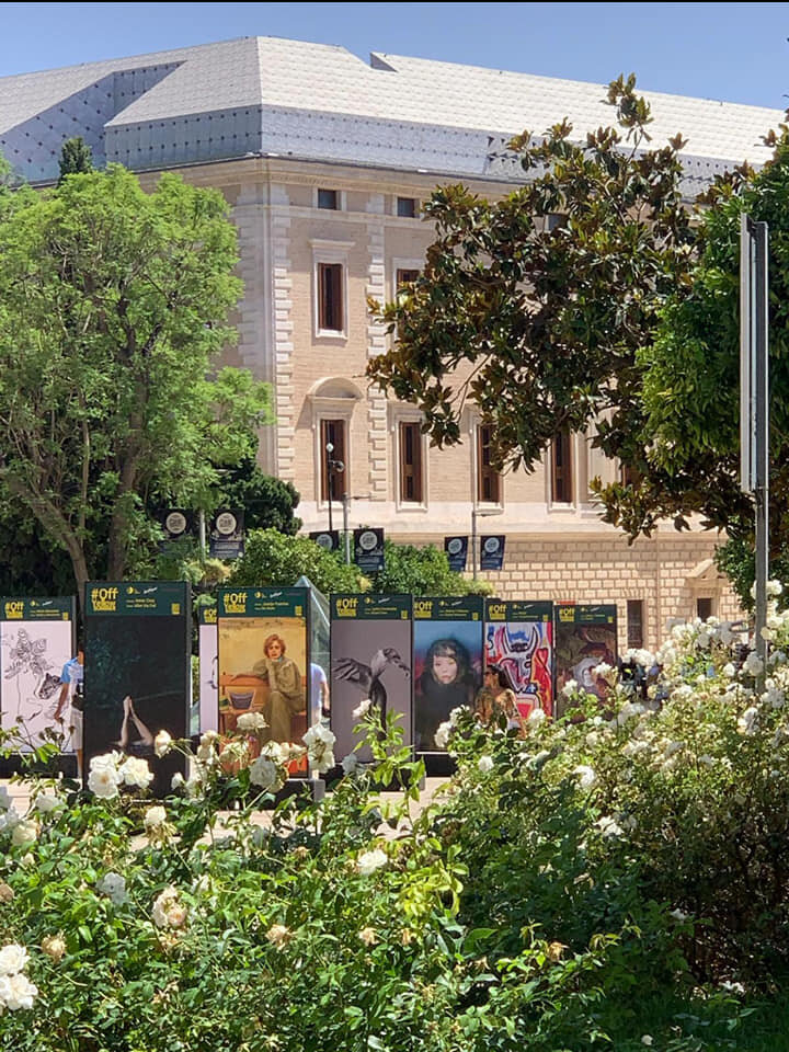 Art exhibition with Malaga Museum in the background