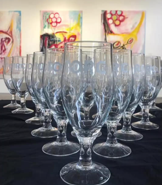 Shiny Torc Brewing glasses all set up for the PIGSY art event