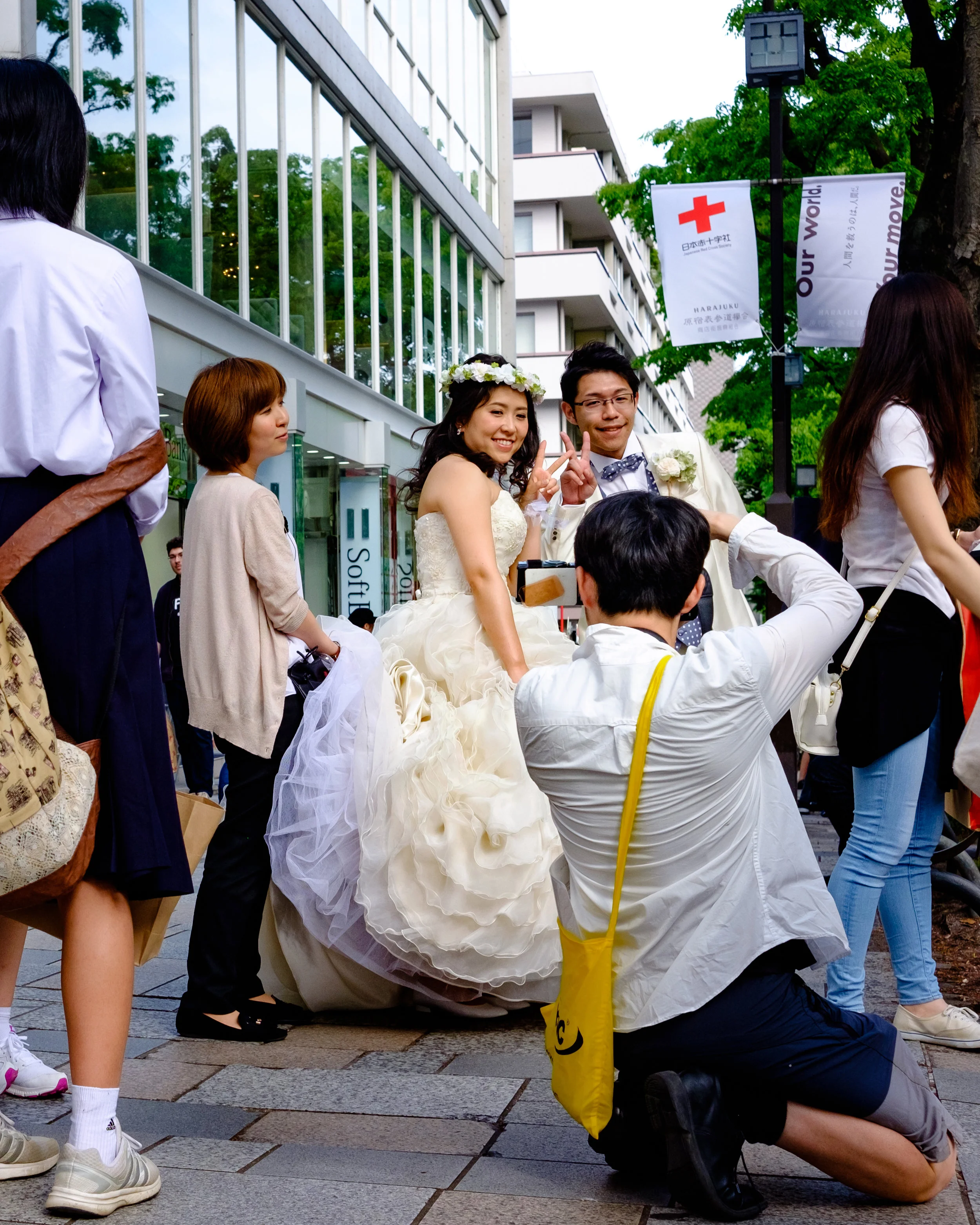 Not a sight you see every day - I was sitting faffing around with my camera bag next to a crossing in Harijuku when this couple stopped waiting to cross the road and their photographer decided it was time to grab some photos.