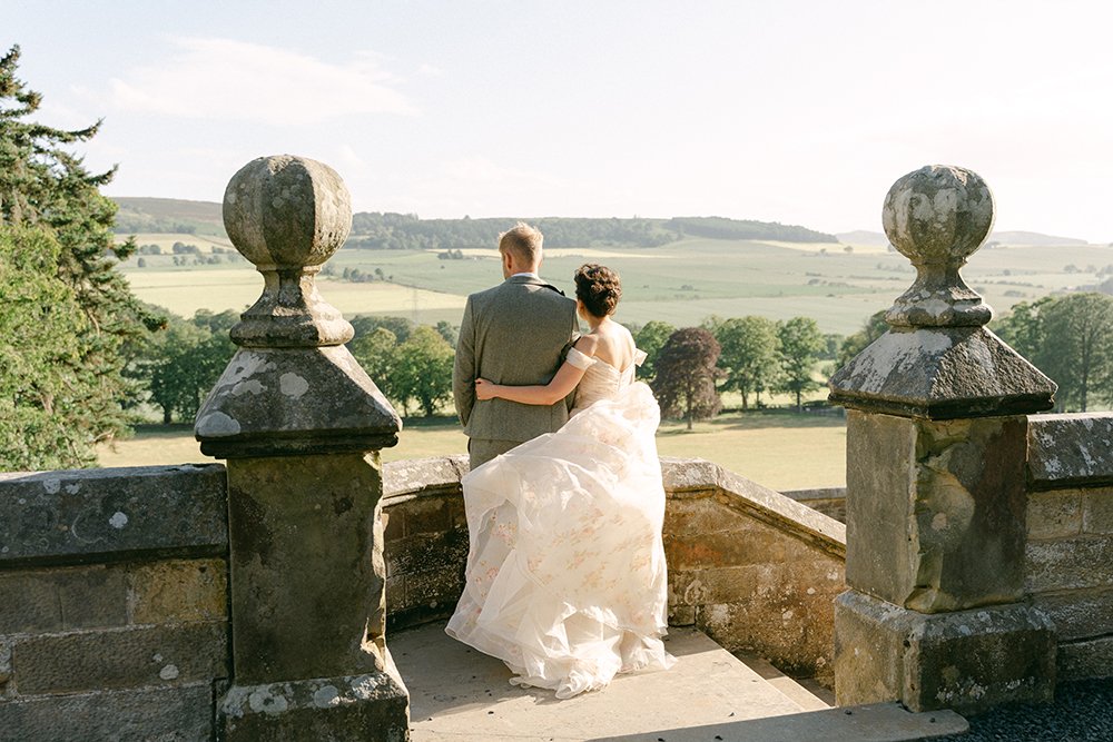 Couple-embracing-viewing-the-Scottish-landscape.jpg