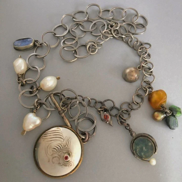 wearable mementos, i've been helping my friend enjoy her collected trinkets