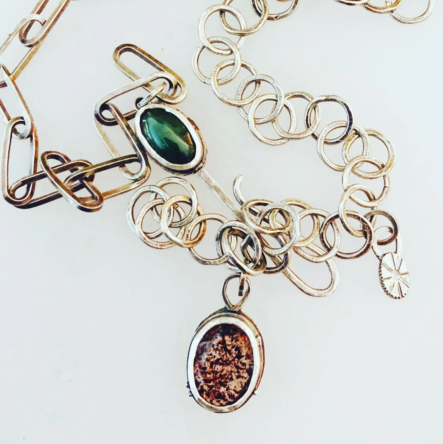 jade, strawberry quartz, with a tiny white topaz