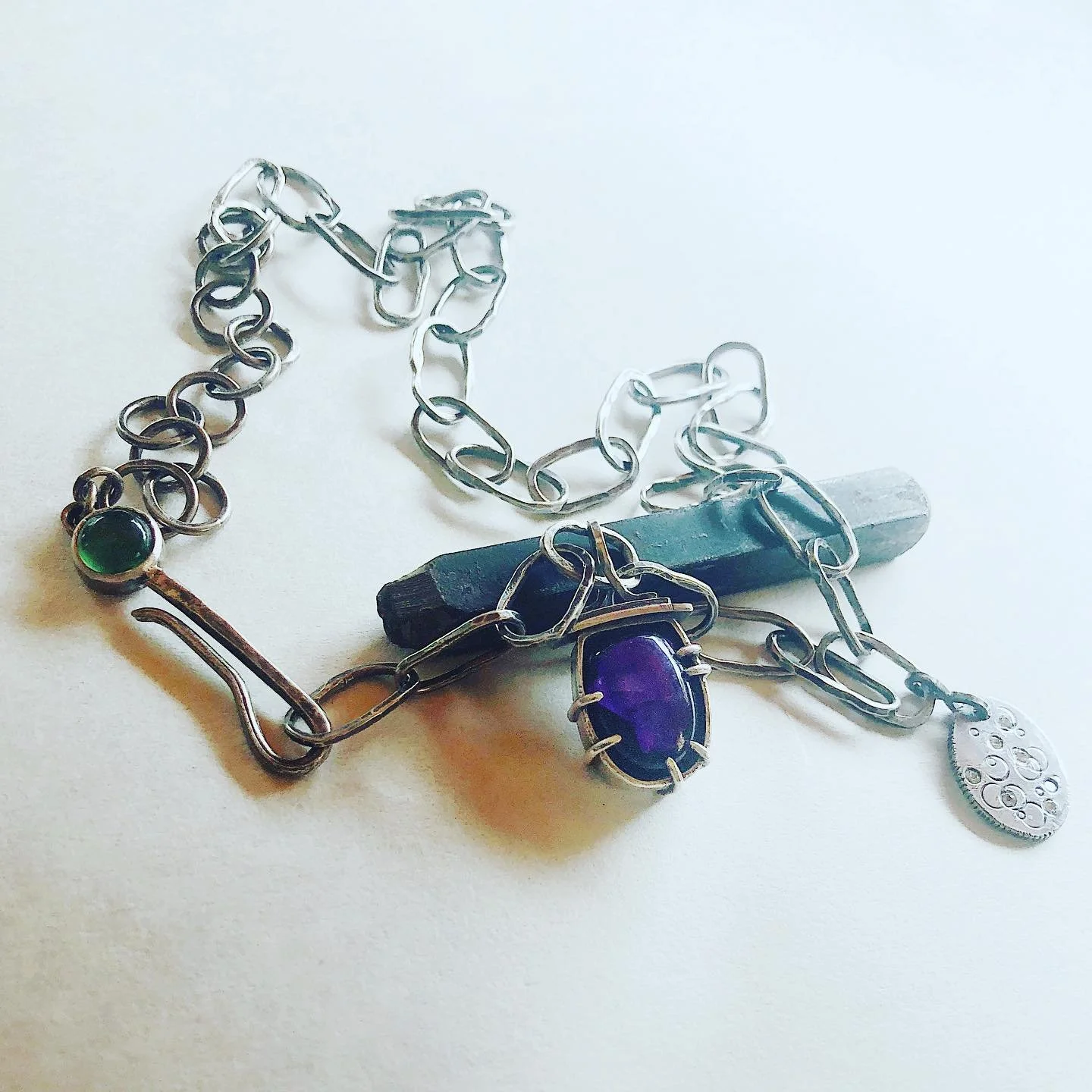 Beautiful but oddly cut amethyst, pondered this for months