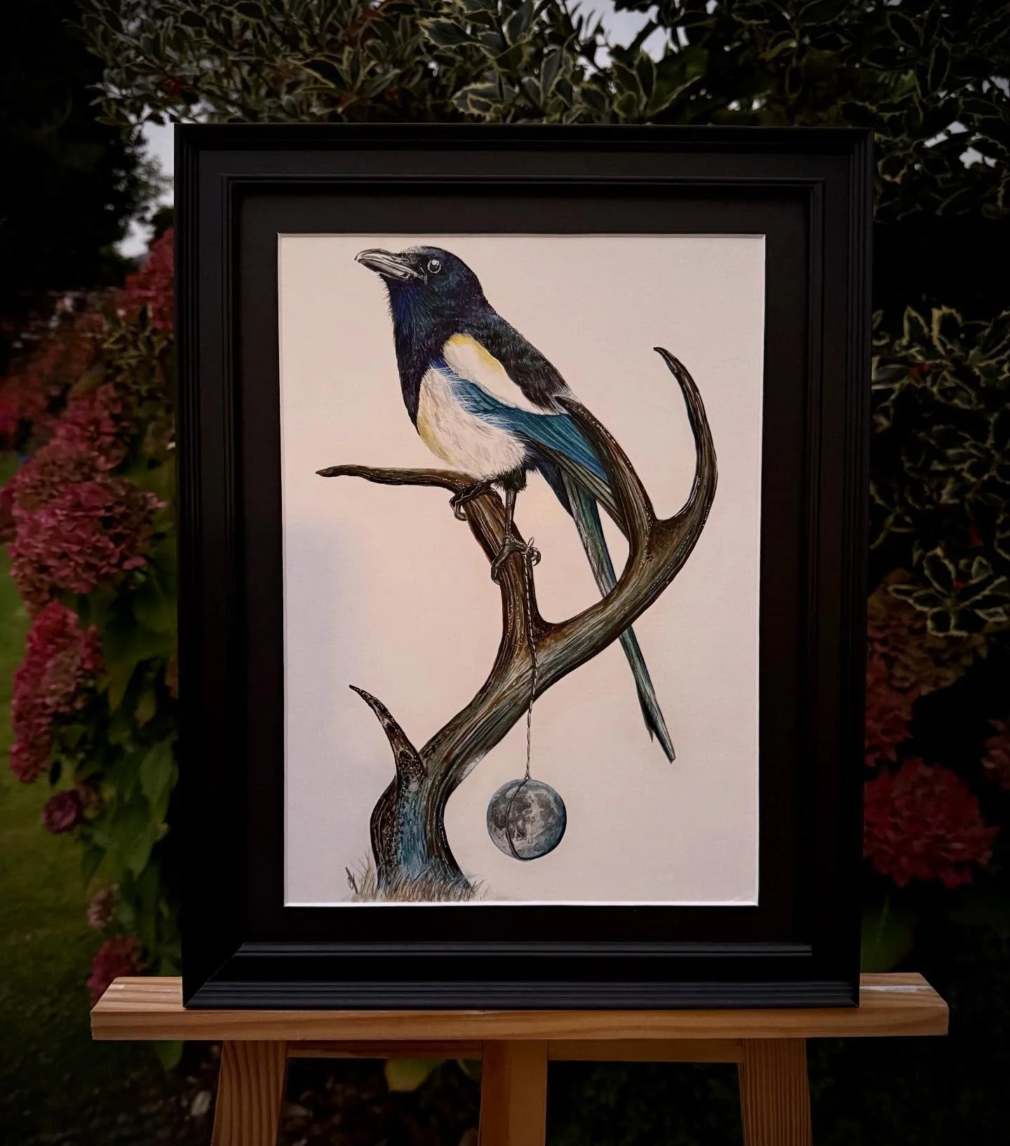 Dusky autumn light 🍂

The magpie sits in quiet watch, a keeper of secrets, balancing moonlight on weathered bone.

Painted in 2021, this piece reminds me that even the collectors of broken things can carry beauty, sometimes we perch in strange place