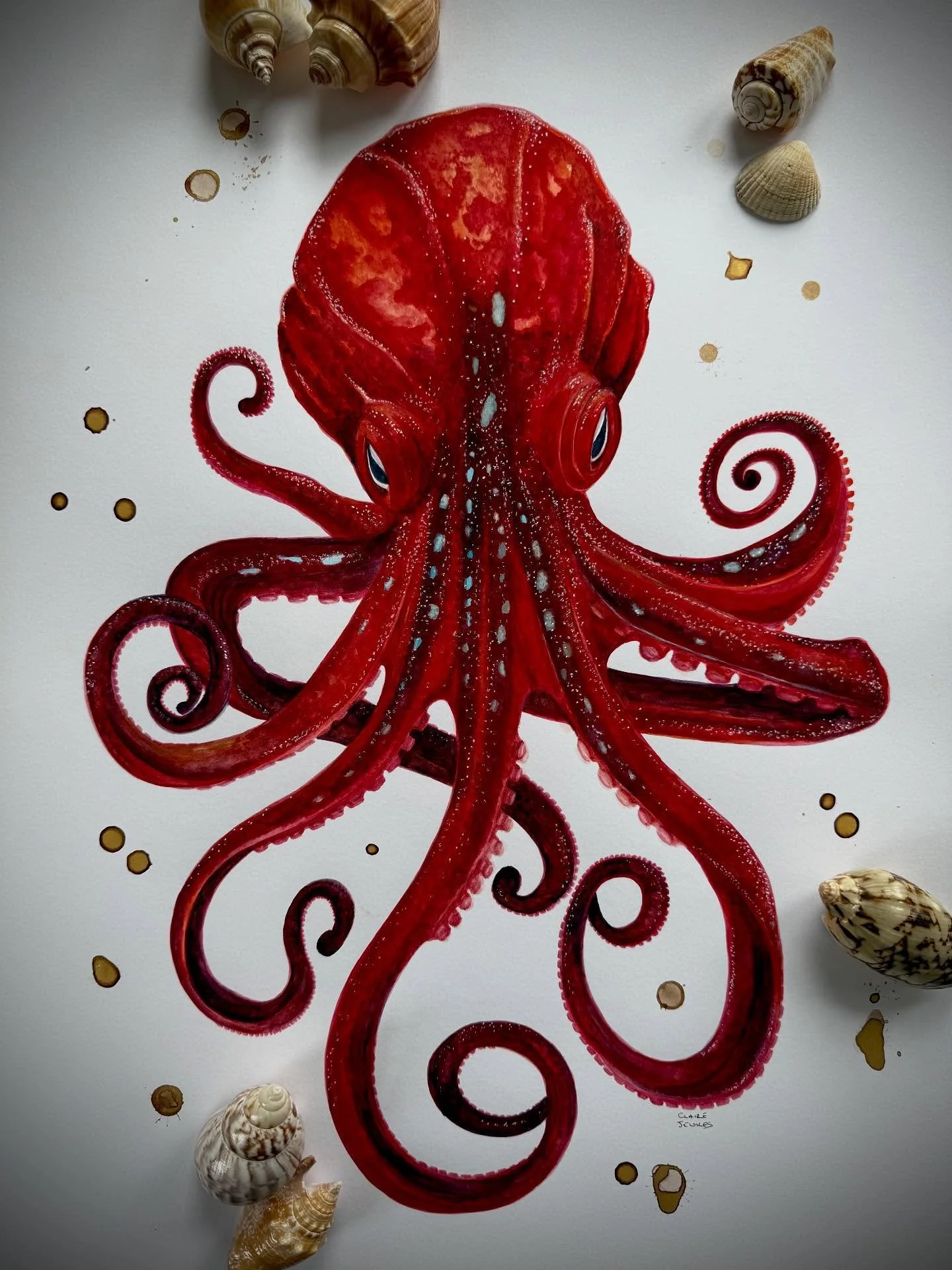 She carries light beneath her skin, metallic, breathing, alive.
A crimson pulse beneath the waves, where the sea turns thought to gold and silence to song.
🐙💀✨

A2 watercolour with ink waves and metallic undertones.

&lsquo;FROM OUR SEA&rsquo; A co