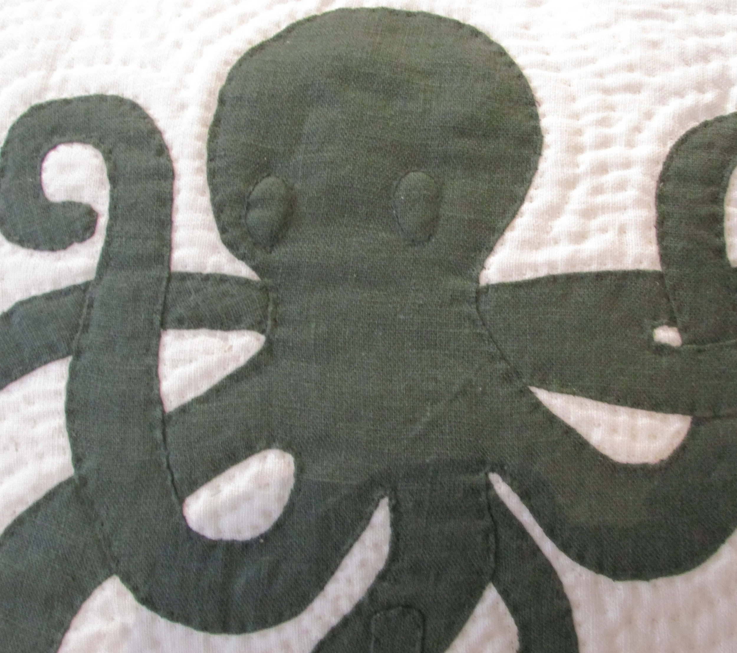 Octopus pillow grn linen close up.JPG