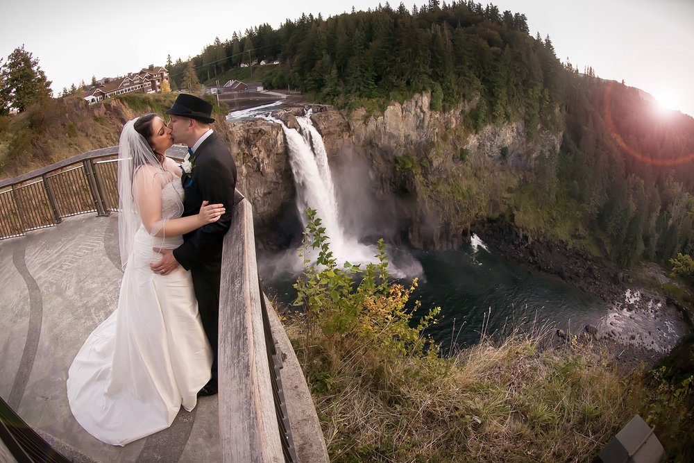 Bride & Groom Kiss by the Waterfall.jpg