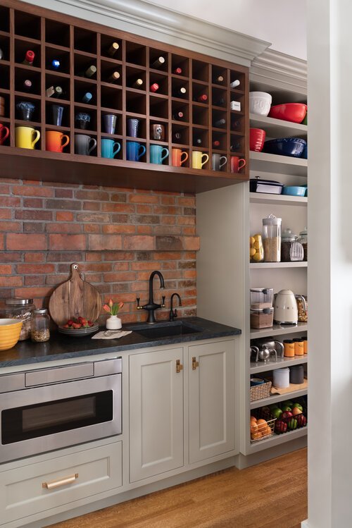 black-marble-red-brick-custom-kitchen-showing-colourful-coffee-mugs.jpg