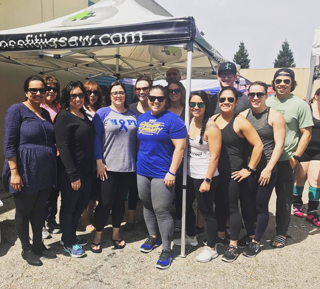 Kim and her support crew during her Strongwaoman competition this weekend