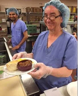 Nutrition and Food Services employee, Lee Bannister, dishing up the bison stew for patients at the Regina General Hospital in celebration of National Indigenous Peoples Day!