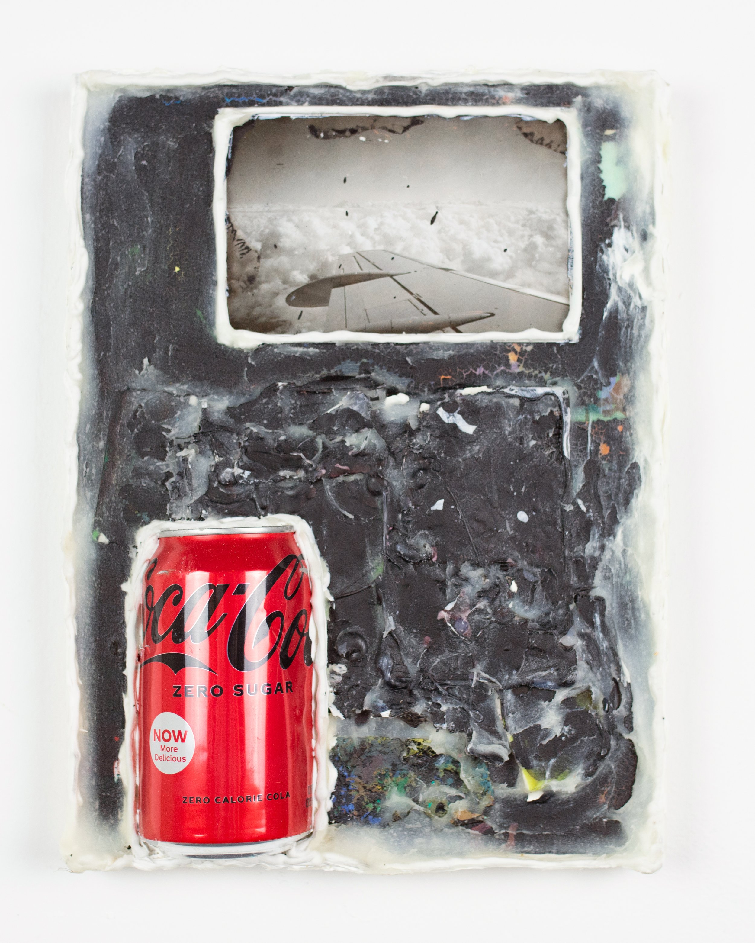    Somewhere Over The Amazon    Oil, acrylic, Sumi ink, family photograph, caulk, cold wax, Coke Zero can mounted on panel    12 x 9 in.       