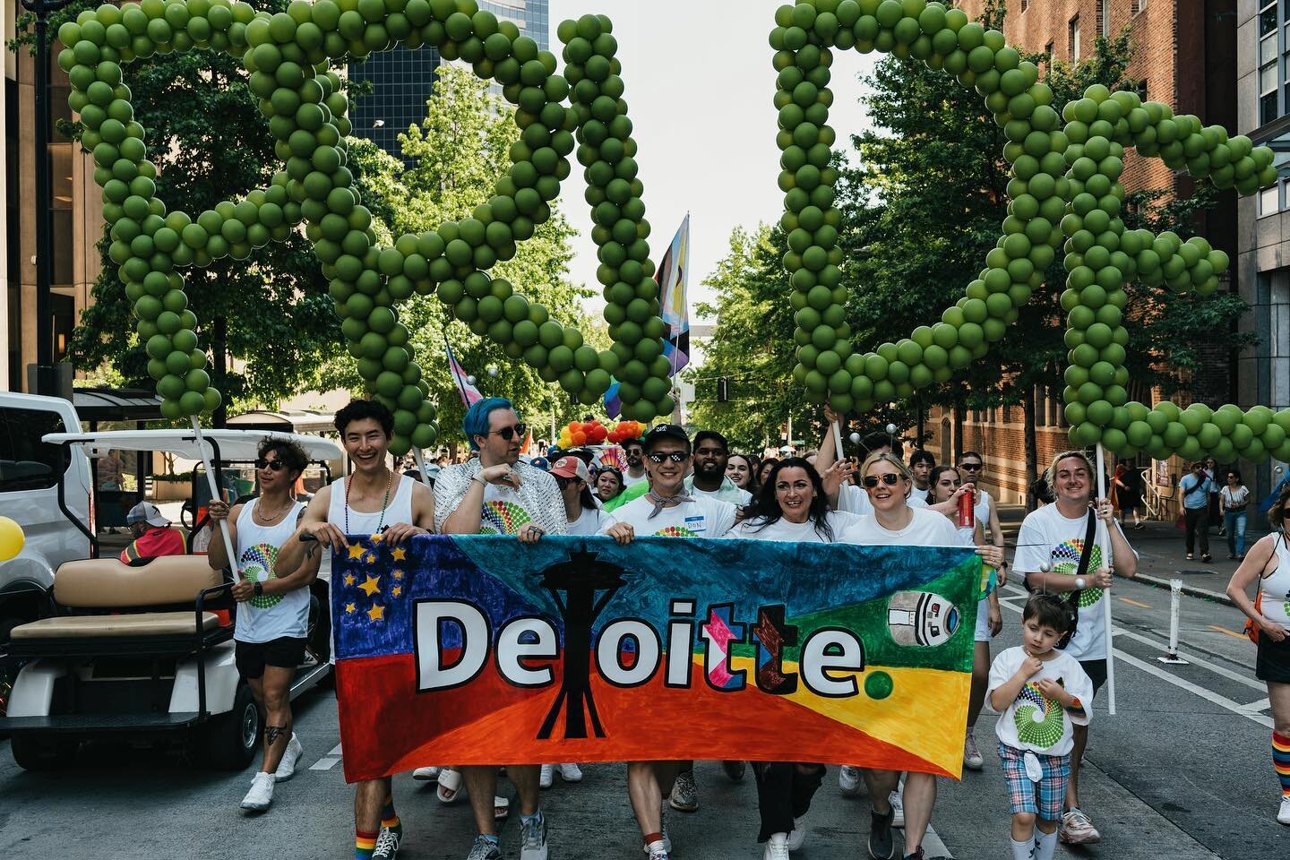 Yesterday I walked in the Pride parade with the Deloitte office of Seattle and the energy of being in the parade vs watching the parade are two very different things. It was such a fun experience!