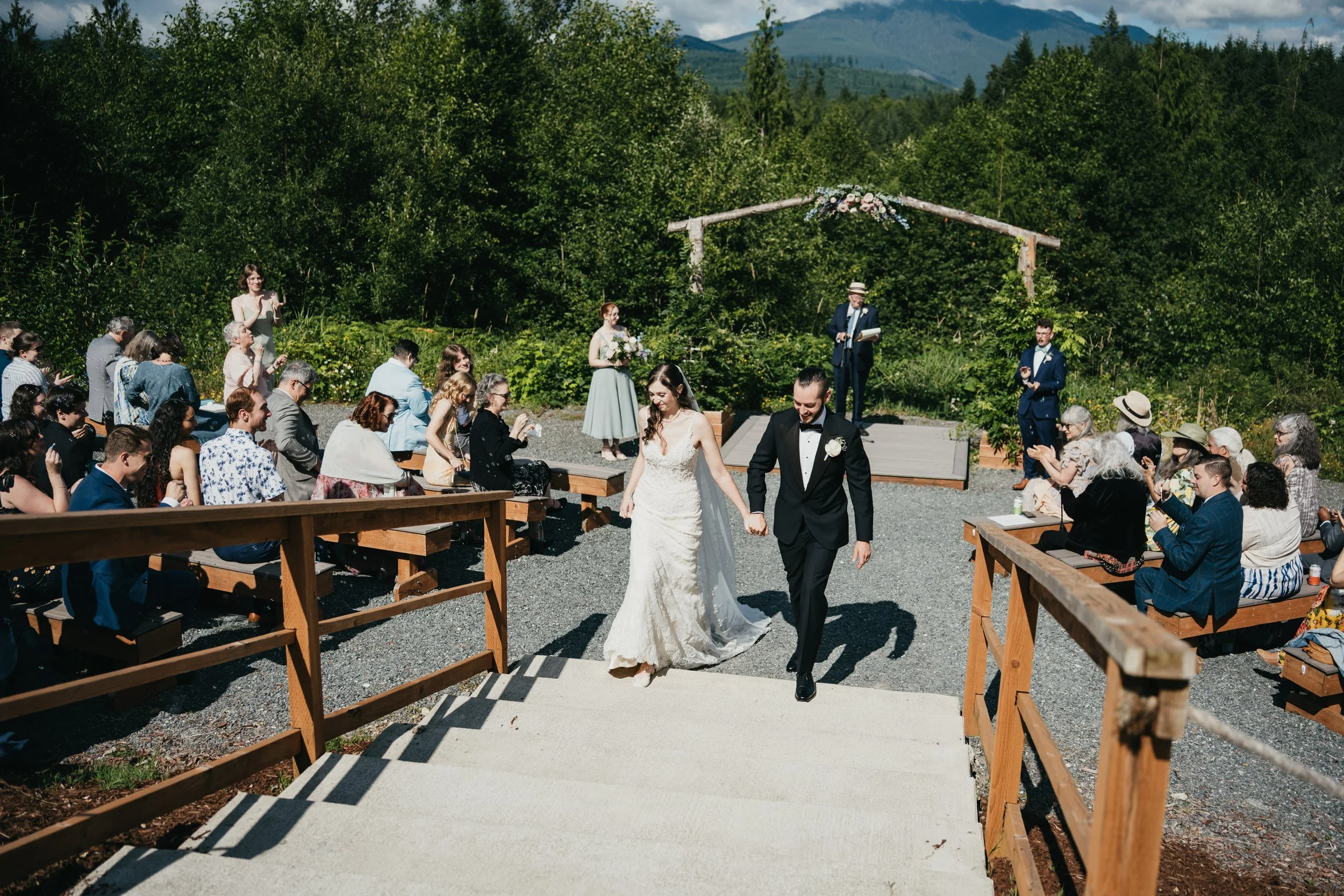a bride and groom recess from the altar at Pretty Bird Weddings venue