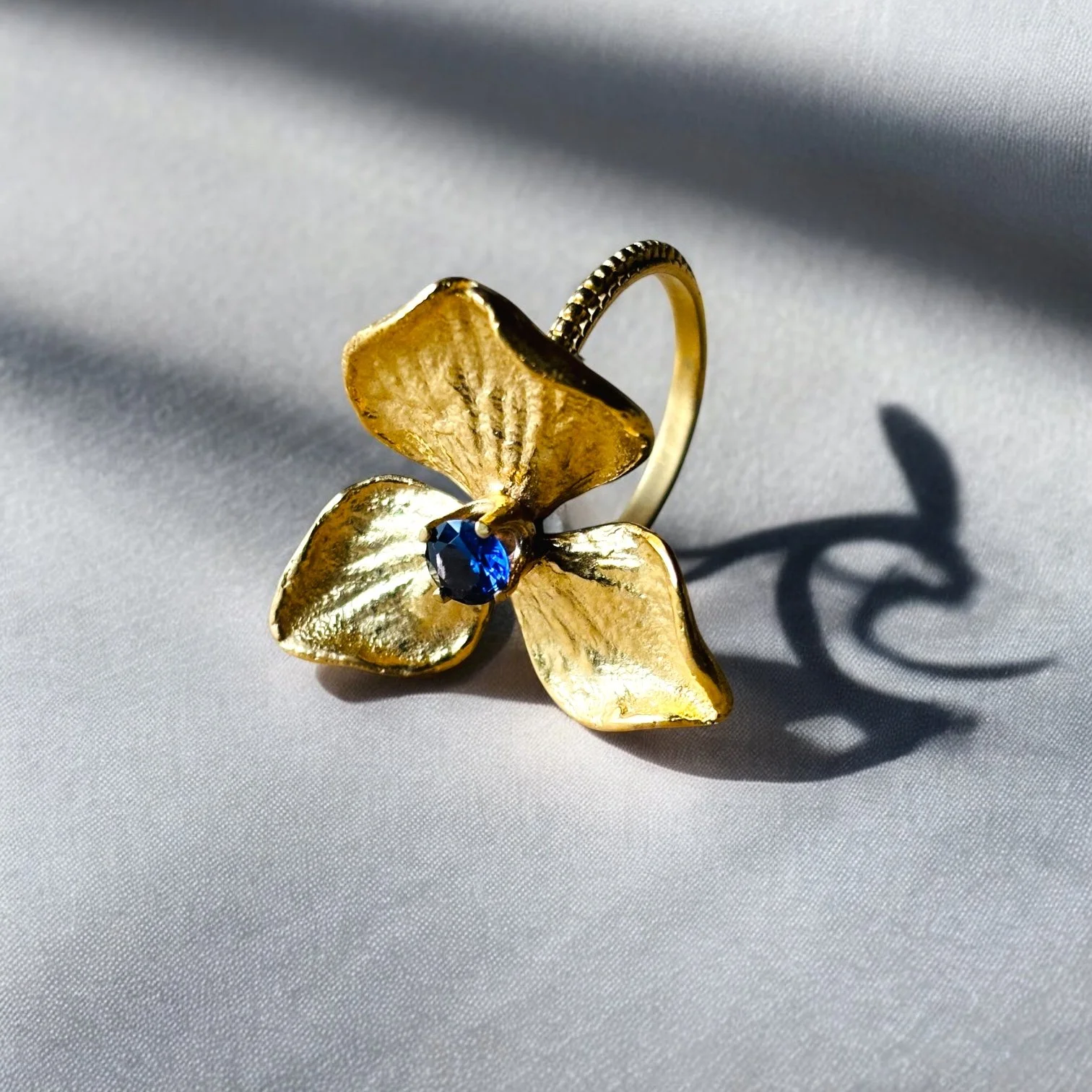 32.GoldTrifold Tanzan0ite1.JPG