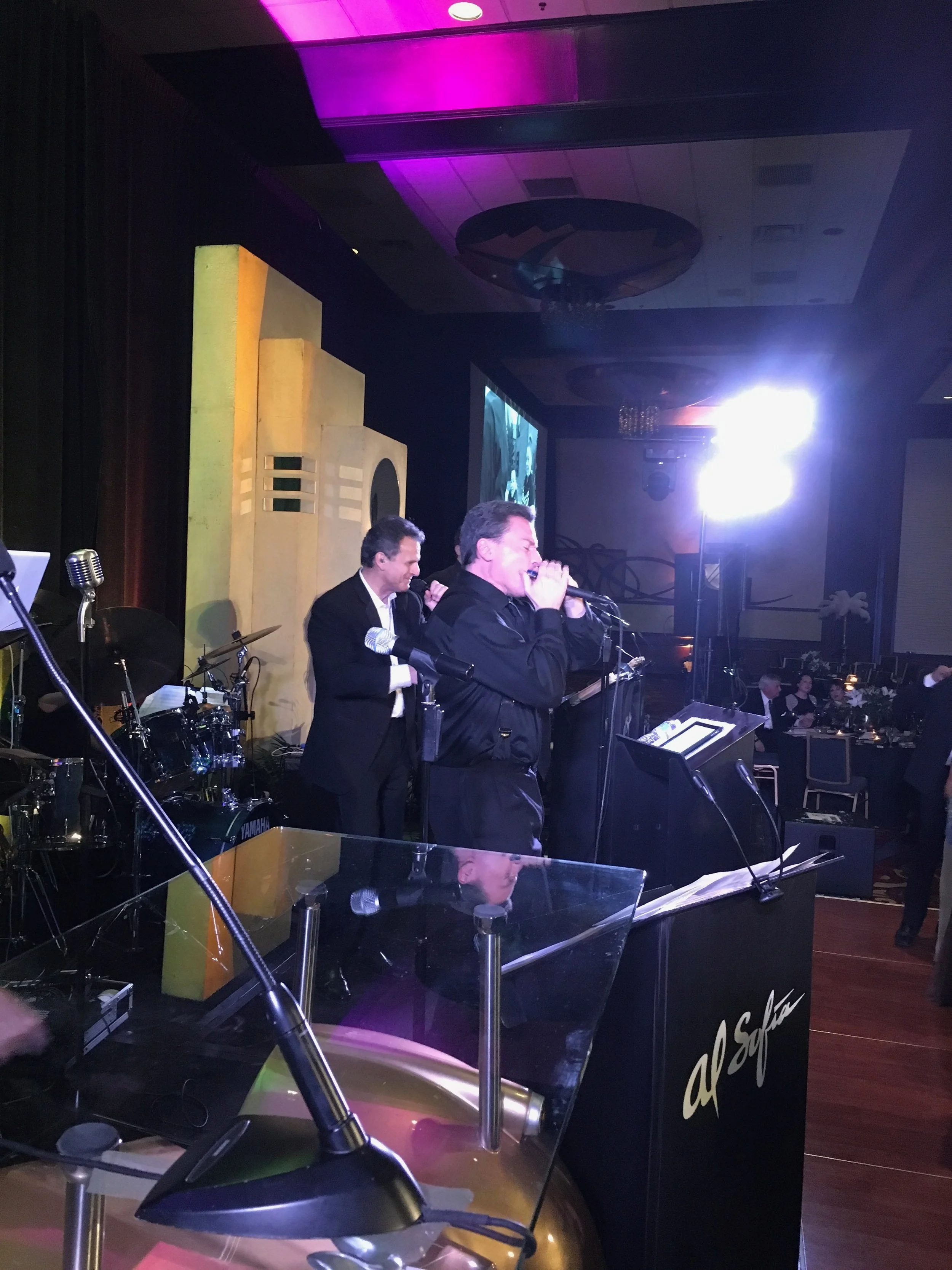 On stage with the Al Sofia Band - harmonica solo on “What I Like About You”