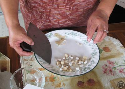Inupiaq resident of Utgiaqvik (Barrow) prepares whale meat with a traditional ulu knife. From: http://icestories.exploratorium.edu/dispatches/big-ideas/the-people-of-the-arctic/the-inupiaq-people-of-barrow-alaska/