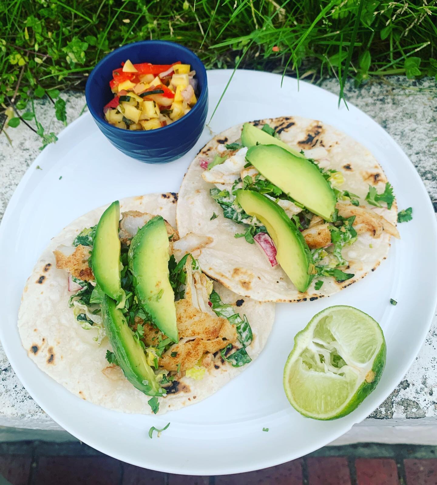 Whole30 Day 25! &bull; This might take the cake ... cod fish tacos with my taco spice mix (cumin, chili powder, oregano, paprika, s+p, onion and garlic powders), crispy radish and romaine slaw, avocado, lime, cilantro and a side of mango salsa ... al